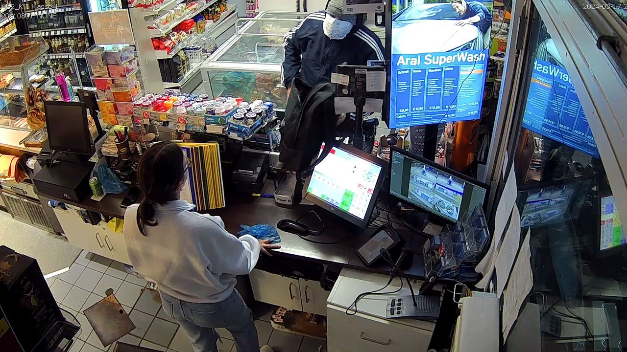 Täter mit Pistole Täter mit Pistole